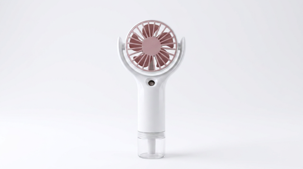 ArcticMist handheld misting fan — real product, white body with pink blades and clear water tank