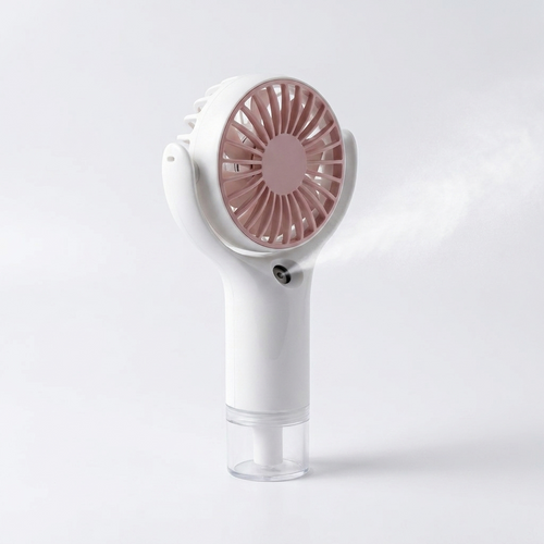 ArcticMist misting fan spraying fine mist — studio shot of actual unit